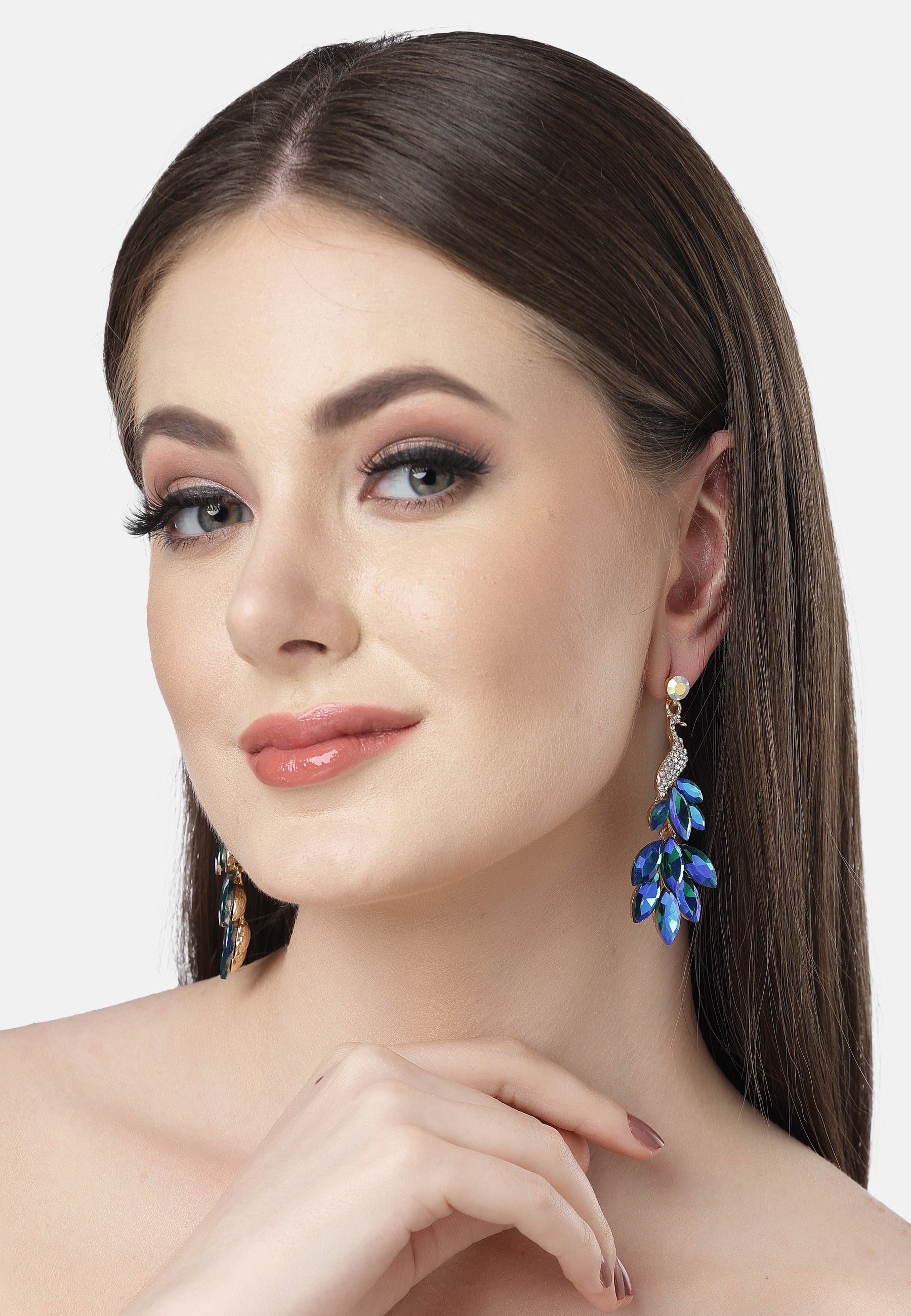 Hermosos aretes de pavo real